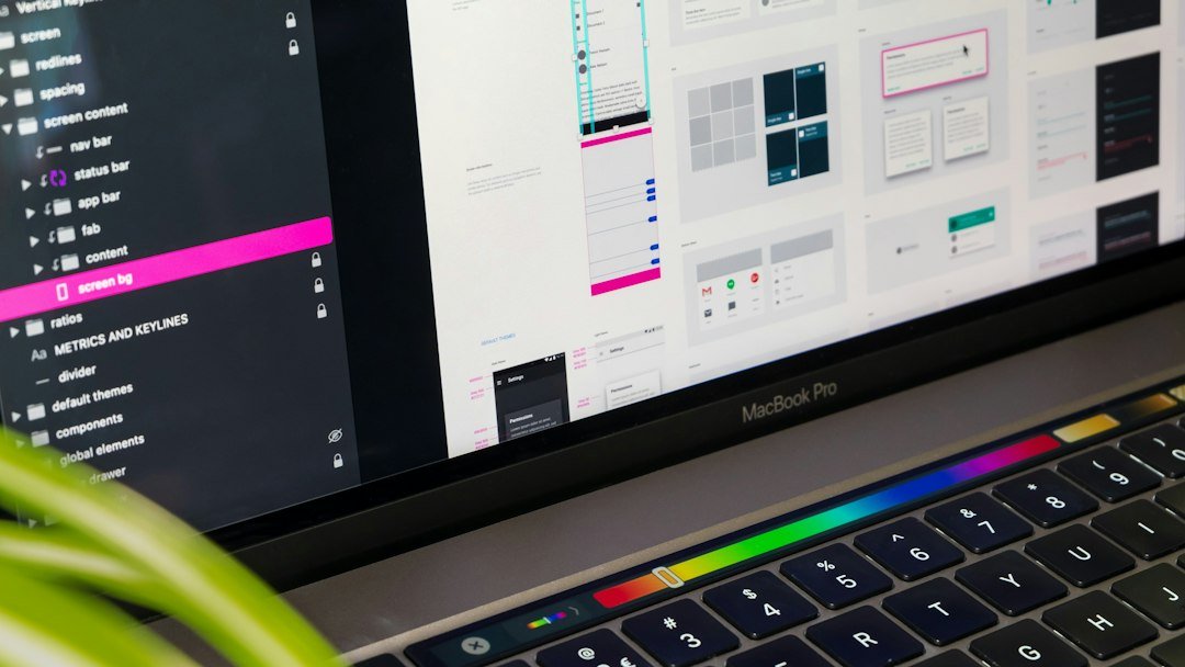 A laptop displaying interface design components